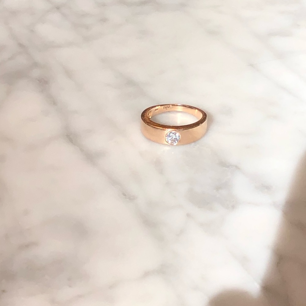 Rose gold and estate diamond bezel-set ring
